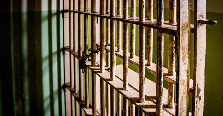 prison-cell-doors-bars.jpg