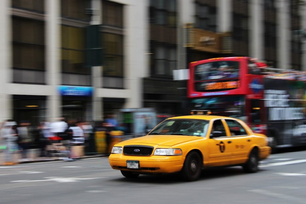 What to Look for When Choosing a Neighborhood in NYC 1 Yellow New York cab, bus, traffic